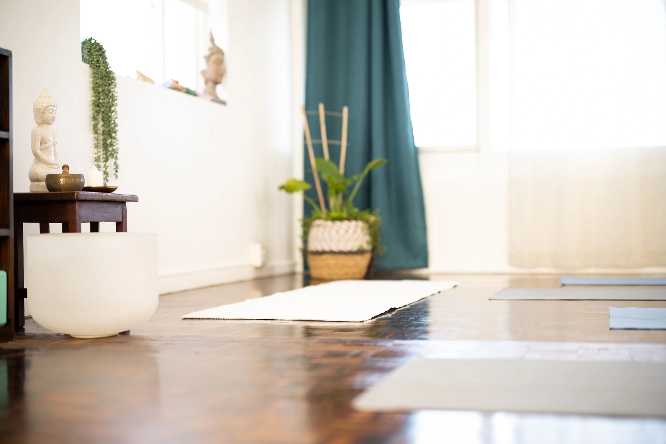 Boutique fitness studio interior with mats and clean modern design