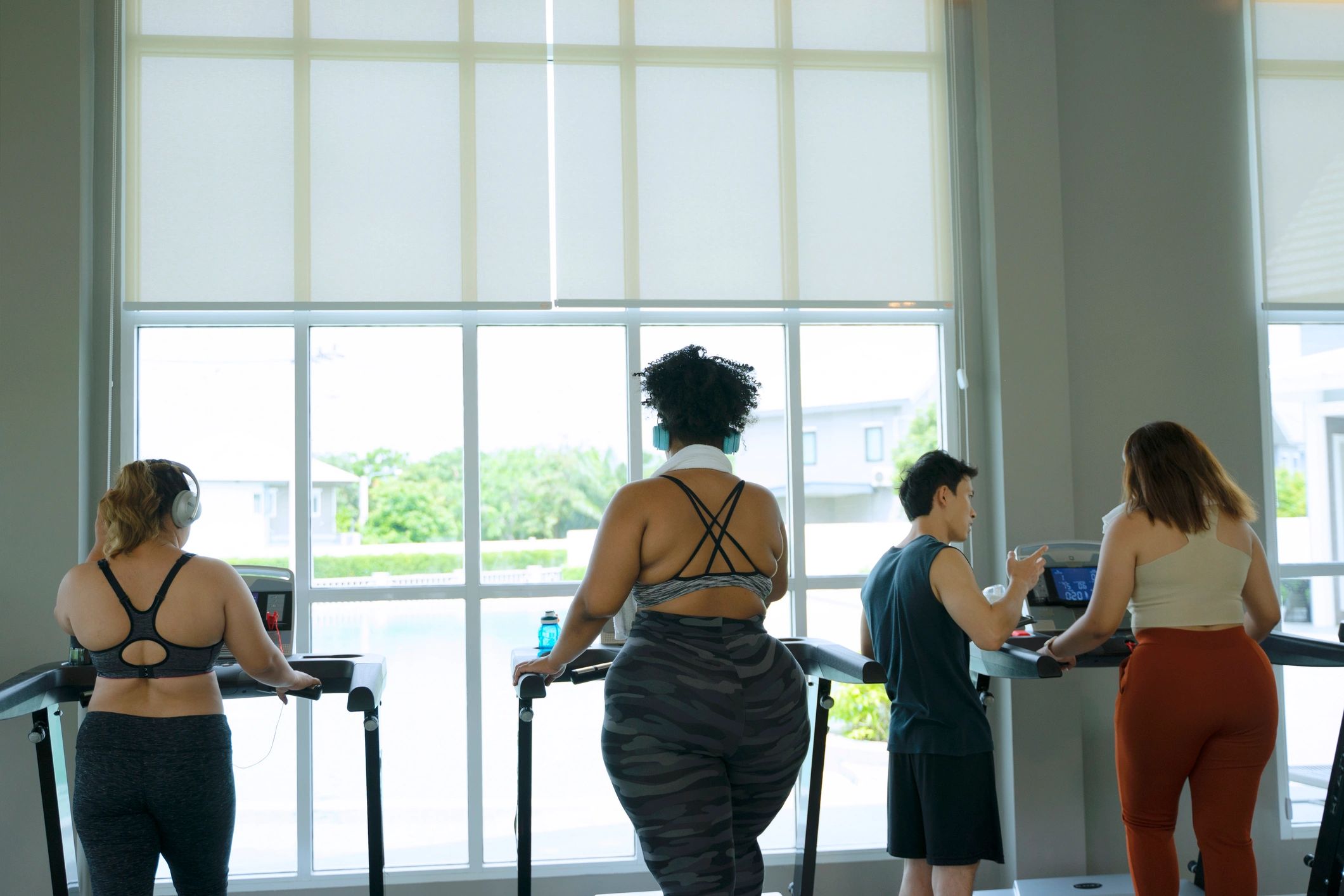 Clients arriving for an upbeat boutique fitness class